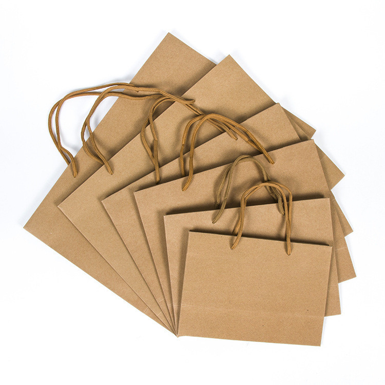 Directly Supply Custom Logo Printed Brown Kraft Paper Shopping Bag with Handle
