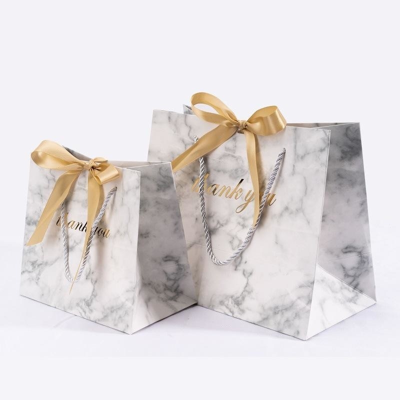 Customized Sealing Handle Gift Bags with Bows for Clothing Jewelry and Gift Packaging
