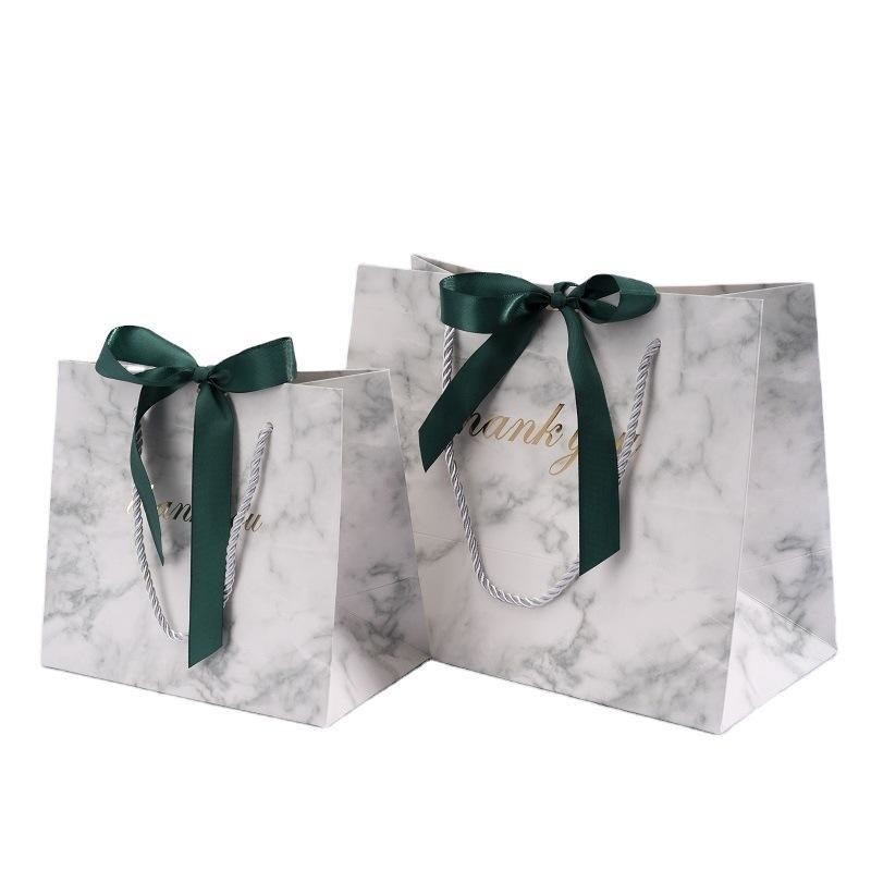 Customized Sealing Handle Gift Bags with Bows for Clothing Jewelry and Gift Packaging
