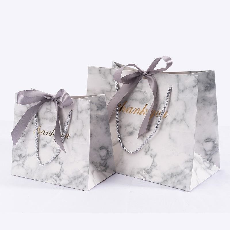 Customized Sealing Handle Gift Bags with Bows for Clothing Jewelry and Gift Packaging