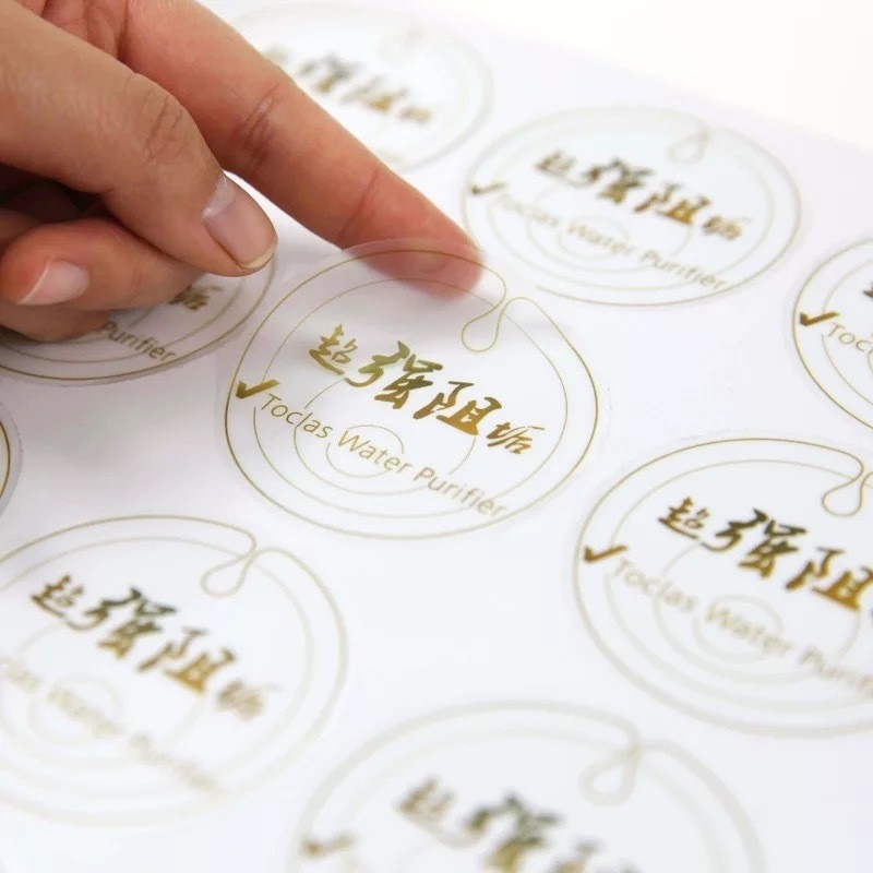 Transparent Carton Sticker Clear Gold Foil Stickers Self Adhesive CMYK PVC Material